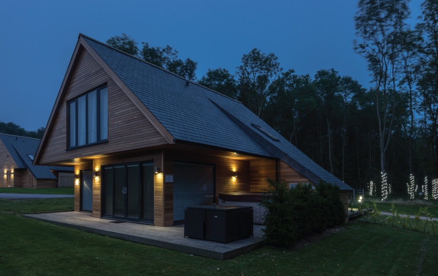 country lodges uk with a big pitched roof