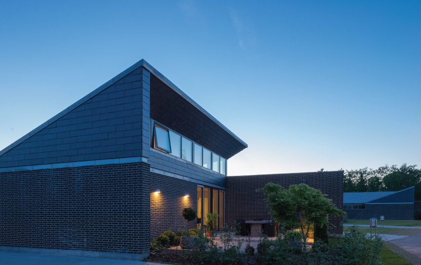 private home in denmark with slopped slate roof