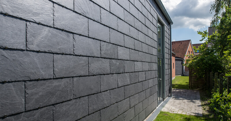 metallic structure for natural slate ventilated façade